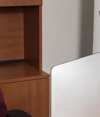 Amber James of Work PEI sitting at a desk