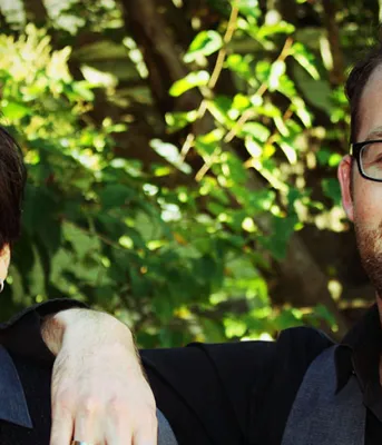 Bobby Cameron, right, stands with his husband Lucas