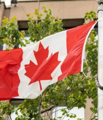 image of a flag in front of a building