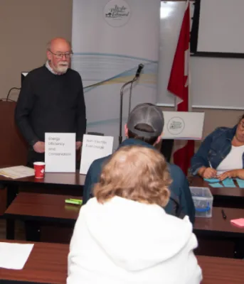 image of people sitting at some tables having a discussion