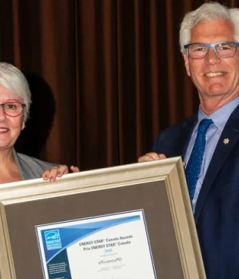 Paula Biggar, Minister of Transportation, Infrastructure and Energy and Jim Carr, Federal Minister of Natural Resources.