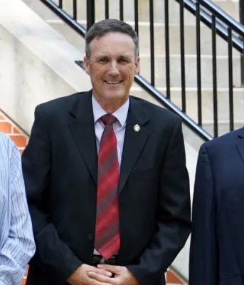 Minister Jamie Fox stands outside the Coles Building representatives of fishers: Ian MacPherson and Bobby Jenkins