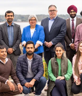 image of group of people in front of water in Georgetown