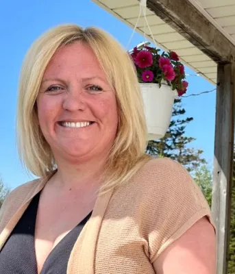 image of a person standing on an outdoor veranda