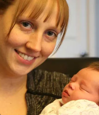 Photo shows new mom Sara McKenna and her baby Emma