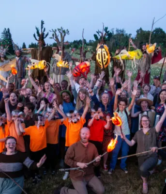 image of a group of people in theatrical costumes in a field