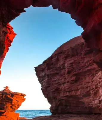 Photo shows the natural archway at Thunder Cove