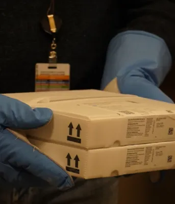 Image of a person carrying a package