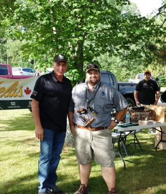 Minister of Communities, Land and Environment Robert Mitchell speaks with Eric Paynter of the Delta Waterfowl Chapter at Saturday’s Youth Waterfowl Day.