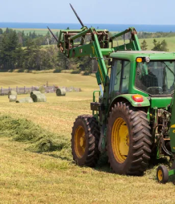 Tractor Bailing Hay