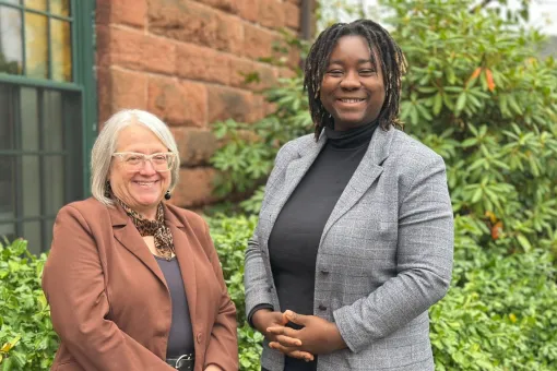 in the photo is Elise Arsenault - left - Director/Analyst of French-language service, and Sandrine Badini - right - Deputy Director