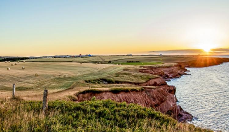 Sunset over the red cliffs  and water at Yankee Hill, PEI