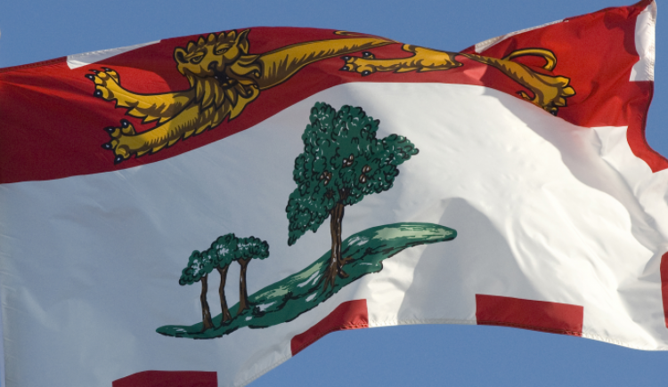 Prince Edward Island flag against a clear blue sky