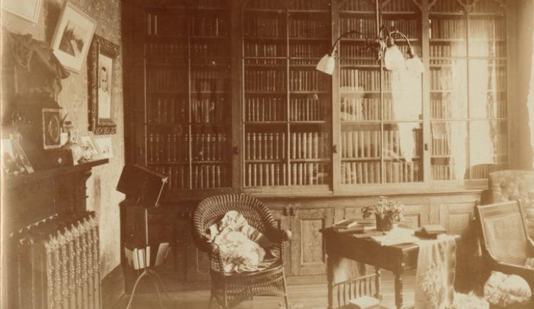 Photograph of an unidentified study or library room showing a wall lined with bookcases, [ca. 1890-1906] (Acc3466/HF72.66.25.24)