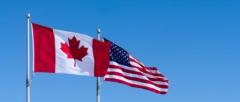 iStock image of Canada and USA flags outdoors