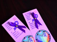 image of purple ribbons attached to purple cards